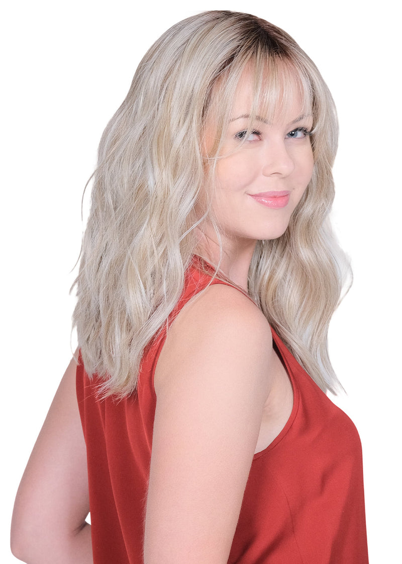 BOMBSHELL BLONDE • 60/88/1001R12 ••• Golden brown root wi pure blonde and satin blonde and a blend of white