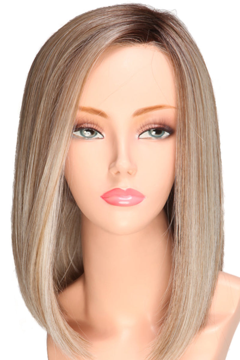 BOMBSHELL BLONDE • 60/88/1001R12 ••• Golden brown root wi pure blonde and satin blonde and a blend of white